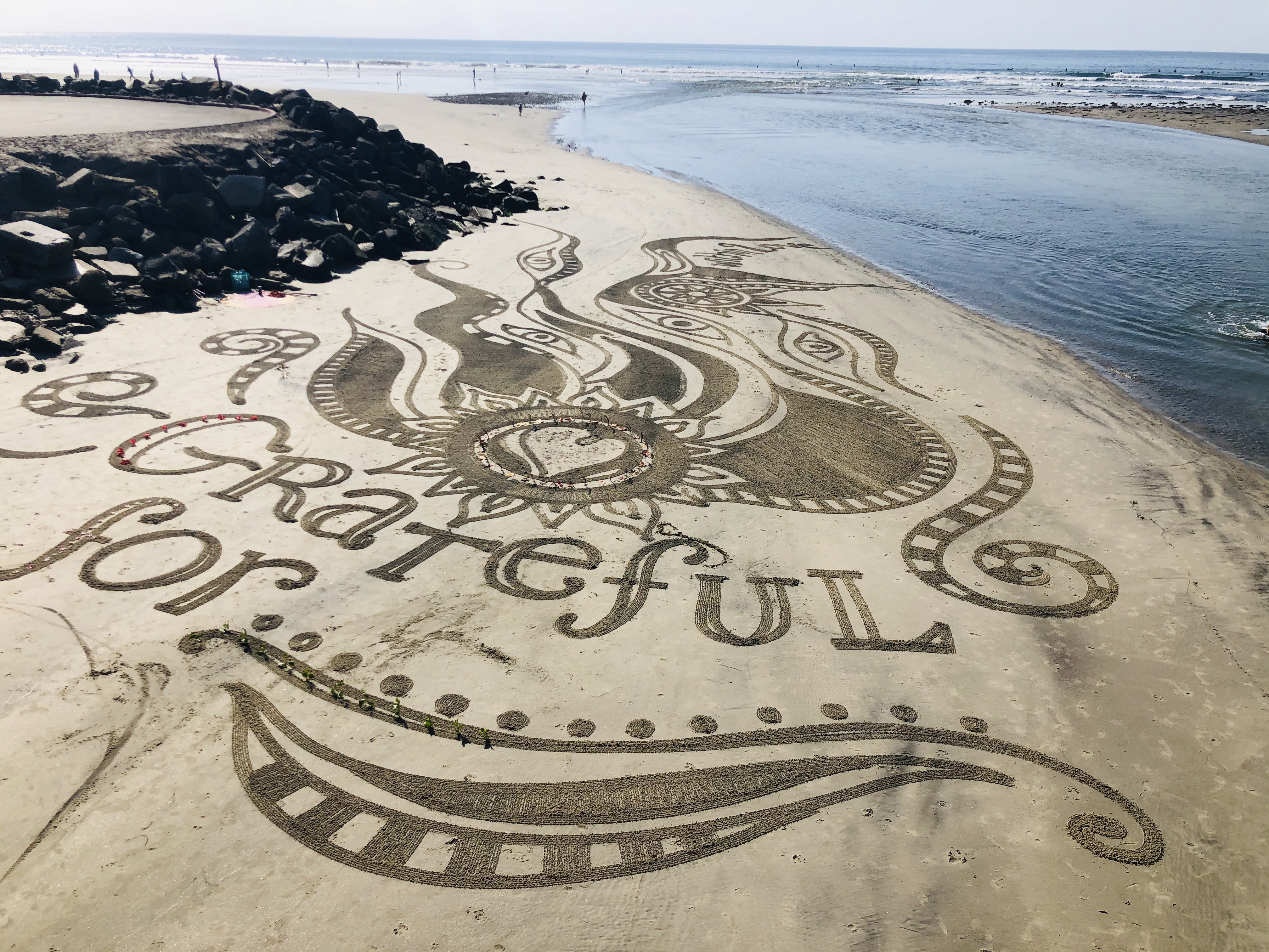 Sand Art creations on San Diego Beaches - Sharon Belknap Design